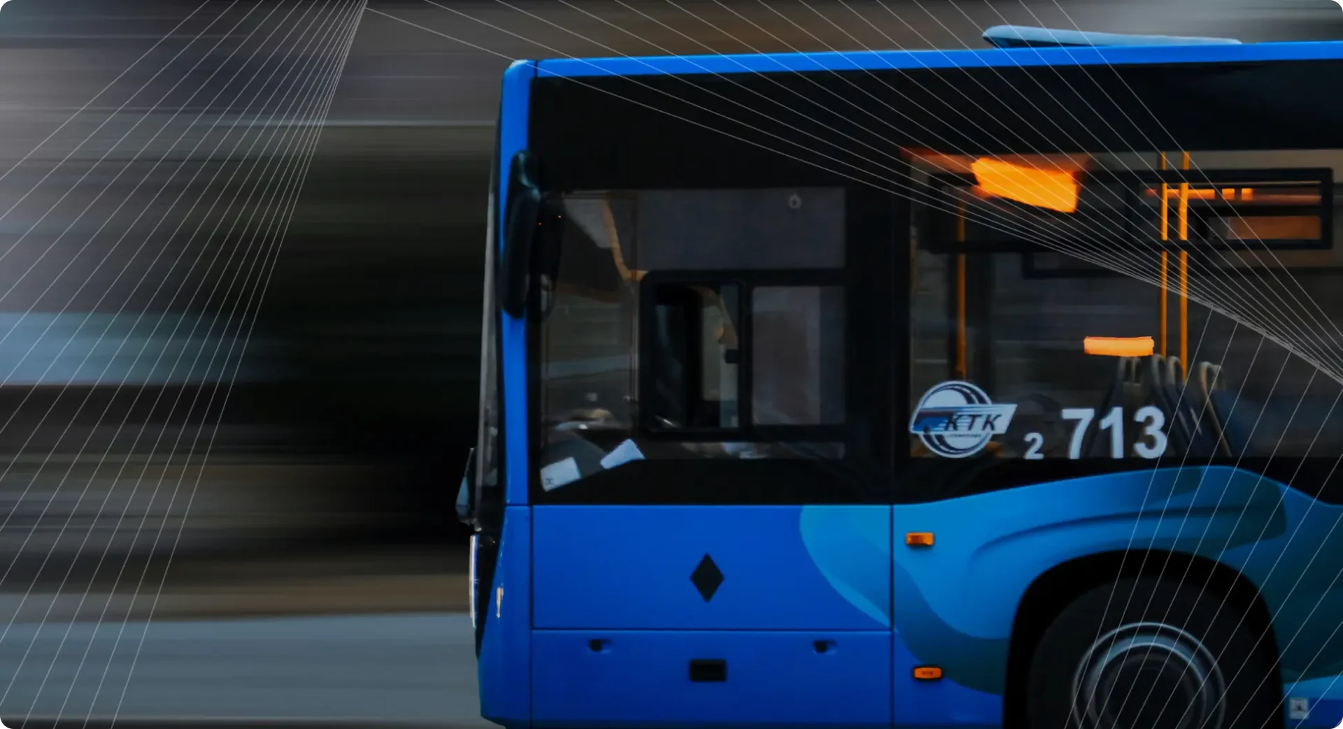 A blue bus in motion