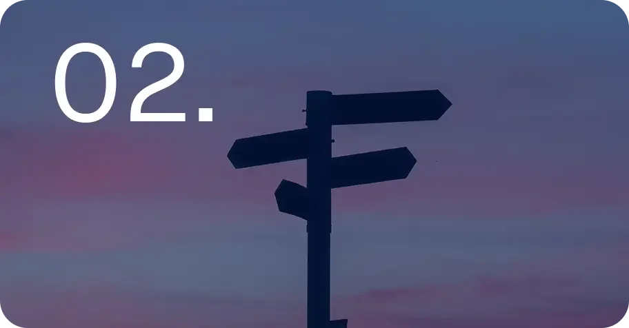 Signs with a blue and pink sky in the background with the number 02. displayed in the foreground.